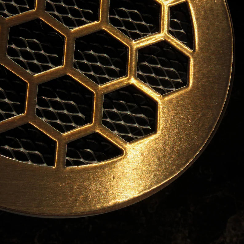 Round brass vent cover