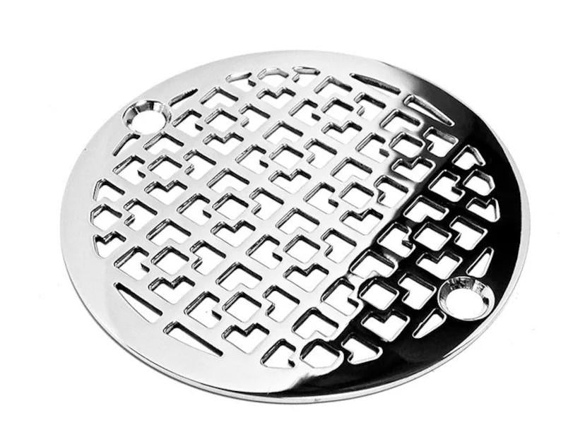 Chrome drain cover with geometric pattern on a white background