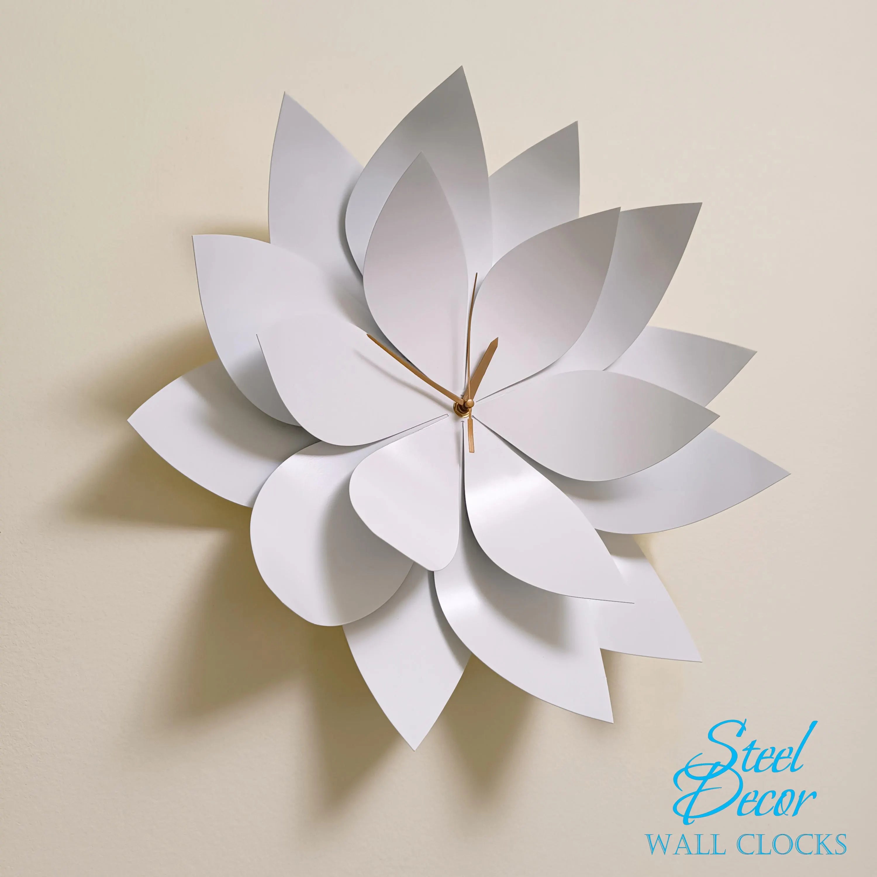 White flower-shaped wall clock on a beige background with 'Steel Decor' branding.