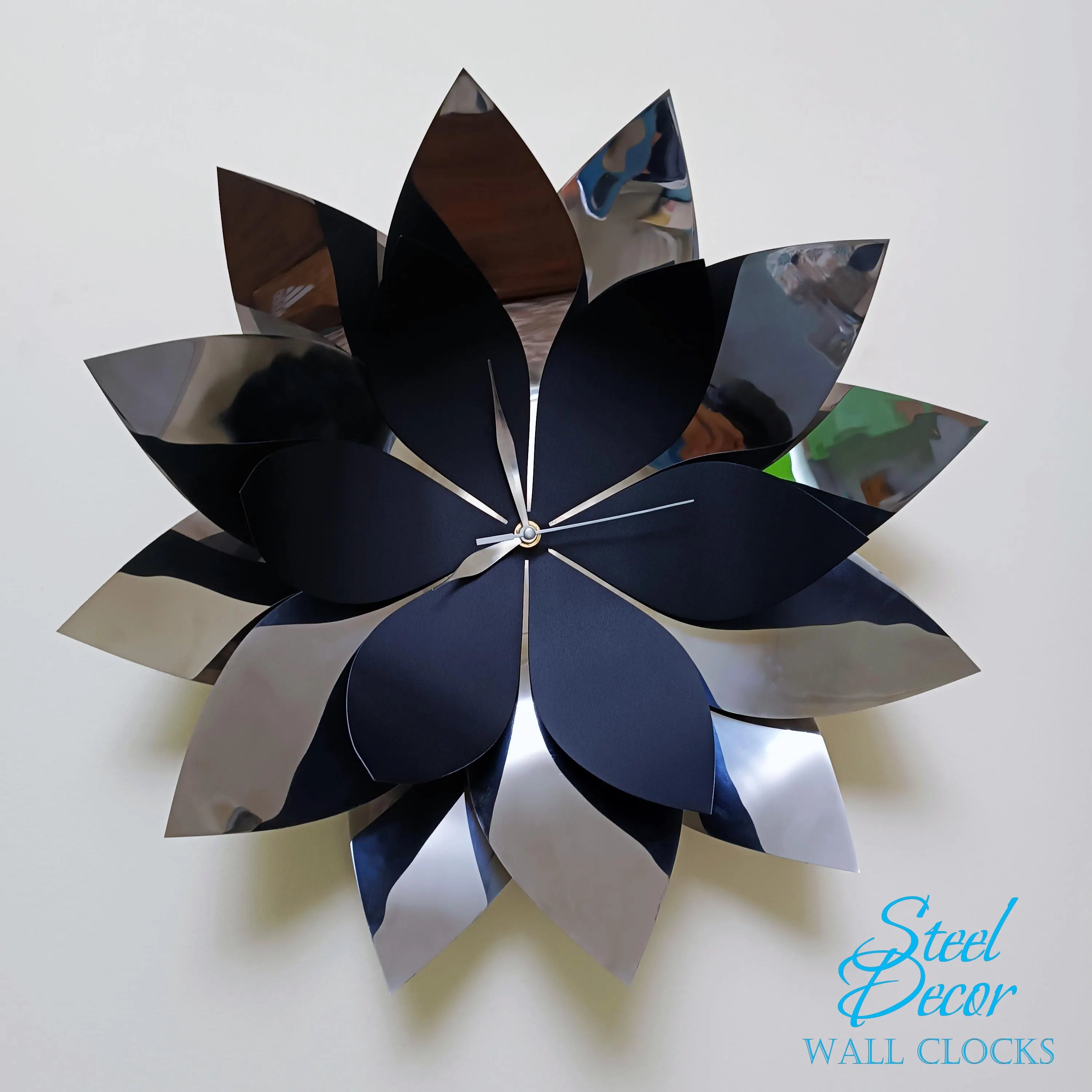 Decorative wall clock with flower design on a white background, branded 'Steel Decor'.